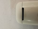 a close up of a white mouse on a white surface