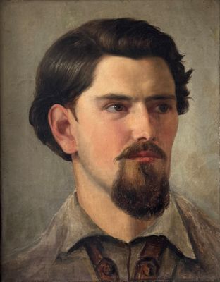 portrait of a man with a beard in a shirt and tie