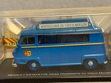 a blue toy van with a sign on top of it