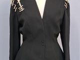 a picture of a black jacket on a mannequin mannequin
