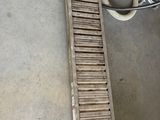 a picture of a conveyor belt in a warehouse
