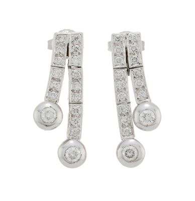 an image of a pair of diamond earrings on a white background
