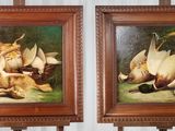 deux tableaux représentant un chat et un oiseau dans un panier posé sur un chevalet
