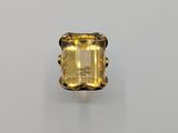 a yellow topazte ring with a square cut stone in the center