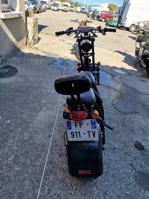a motorcycle that is parked on the side of the road