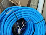 a blue hose that is inside of a box