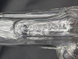a close up of a glass object on a table