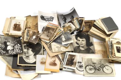 a pile of old photos of women and bicycles