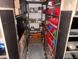a small room with a lot of boxes and shelves