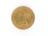 une pièce d'or ornée d'une tête de femme