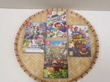 un panier sur lequel sont posés des jeux vidéo