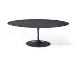 a black table with a marble top and a black base