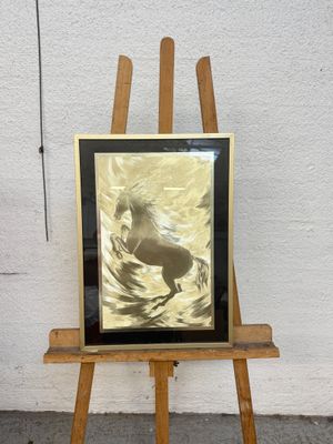 une photo d'un tableau représentant un cheval sur un chevalet