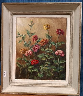 an oil painting of flowers in a white frame on a blue wall