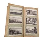 an old book with a bunch of pictures inside of it