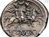 a close up of a coin with a horse and rider on it