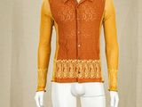 an image of a mannequin dressed in orange and yellow