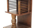 a wooden table with a shelf on top of it