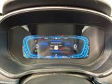 the dashboard of a car with a digital display on it