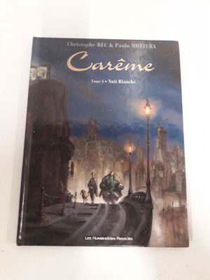 la couverture d'un livre sur laquelle figure une photo d'une ville la nuit