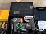 a tool box with tools in it sitting on the floor