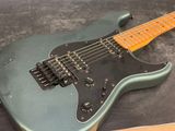 an electric guitar that is sitting on a table