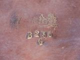 a close up of a brown leather case with numbers on it