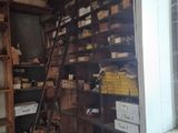 a ladder that is leaning against a wall in a room