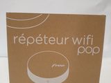 a cardboard box with a picture of a wireless device on it