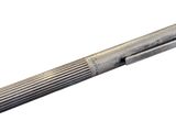 a pen that is sitting on top of a table