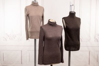 three mannequins that are on display in a room