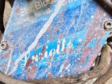 a close up of a motorcycle with a sign on it