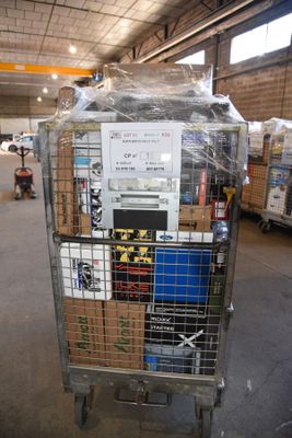 a cart that has many boxes on it in a warehouse