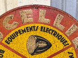 a sign on the side of a building that says shell equipment