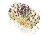 an image of a multicolored beaded bracelet on a white surface