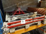 a pile of assorted items on a shelf in a warehouse