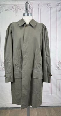 an image of a coat on a mannequin stand