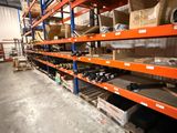 a lot of shelves in a warehouse with many items on them