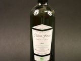 a bottle of wine that is sitting on a table