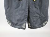 an image of a pair of shorts with buttons on them
