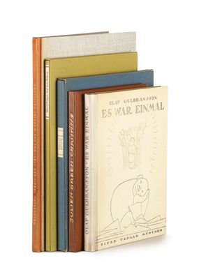 three books are stacked on top of each other on a white surface