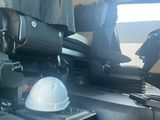 a hard hat and hard hat in the back of a truck