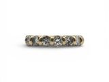 a close up of a diamond ring on a white background