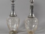 pair of silver and clear glass salt and pepper shakers