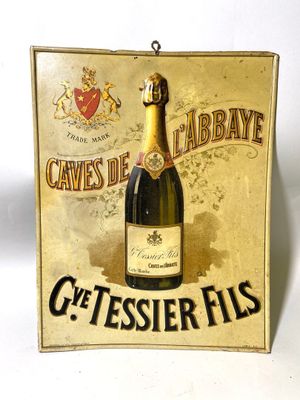 une affiche sur laquelle figure une bouteille de champagne