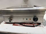 an image of a hot plate on top of a table