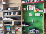 a store with a lot of different items on the shelves