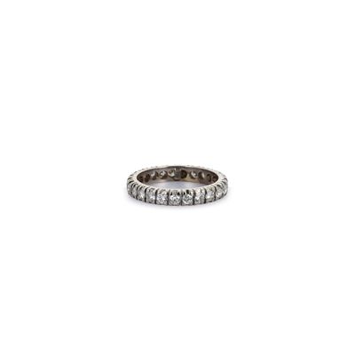 a close up of a diamond ring on a white background