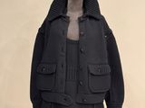 an image of a black coat on a mannequin