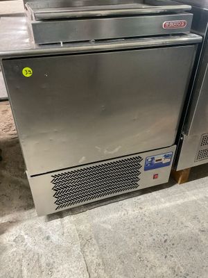 a stainless steel dishwasher sitting on the floor